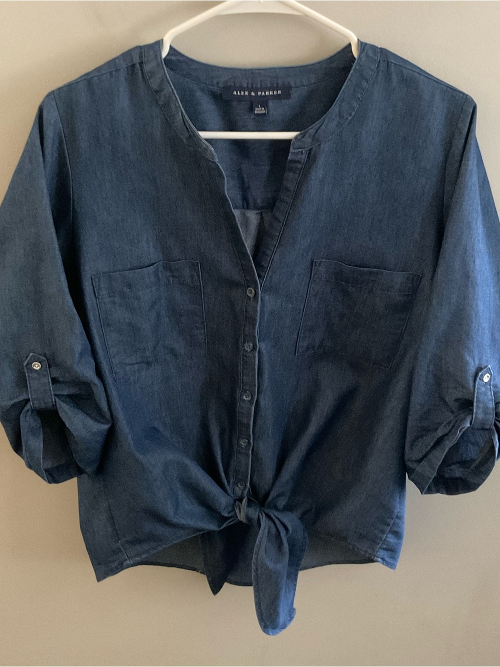 Blue Cambray or denim-style button-down top by Alex & Parker.